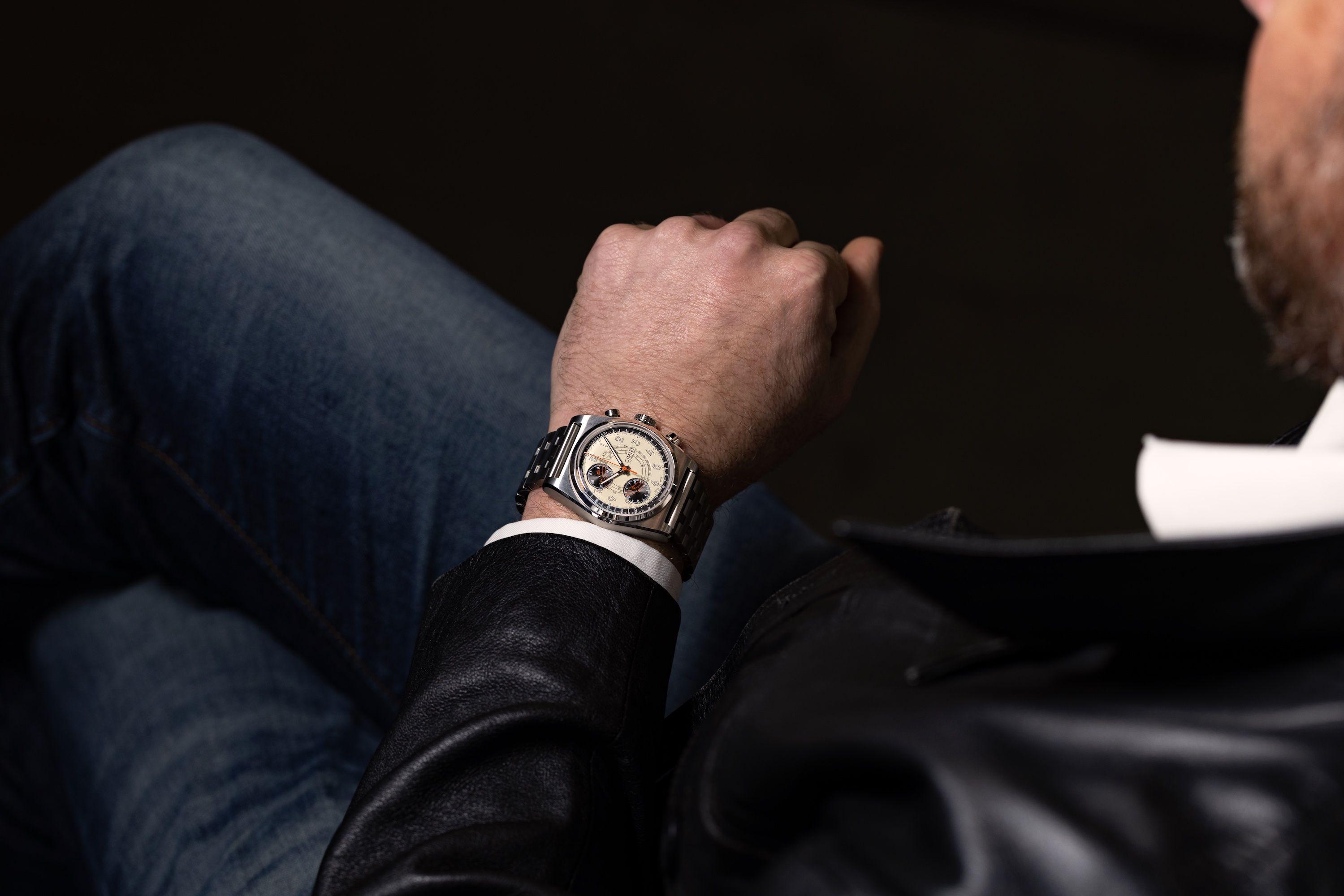 Man wearing Cimier wristwatch with white dial and steel strap